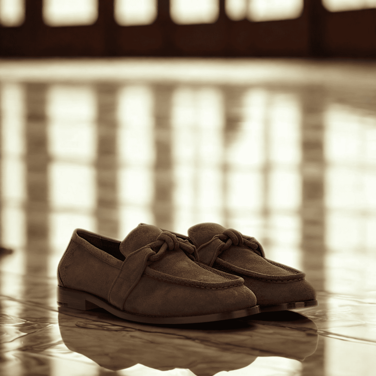 Bottega Veneta suede loafers in warm brown, featured in THE WISHLINE 2025 All Seasons Men’s Collection — showcasing timeless Italian craftsmanship, soft textures, and refined everyday luxury.