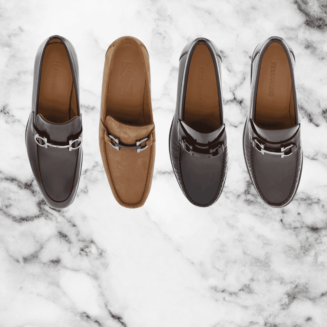 Top view of four Ferragamo loafers in different colors and styles at Men's Fashion Boutique