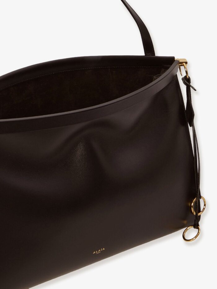 alaia east west leather bag with engraved logo ALAIA East West Leather Bag With Engraved Logo