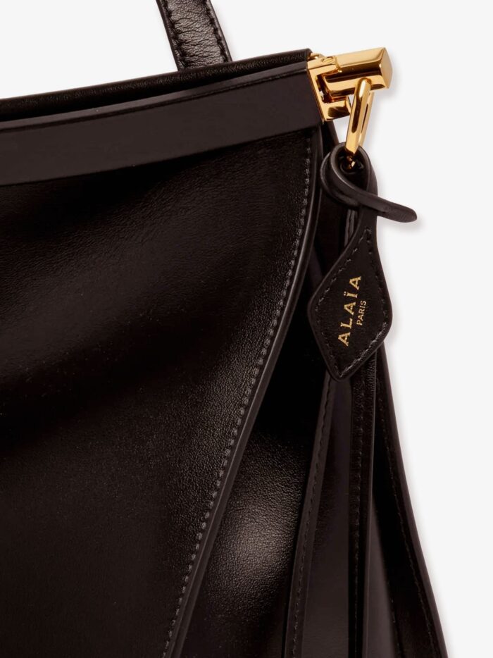 alaia east west leather bag with engraved logo ALAIA East West Leather Bag With Engraved Logo