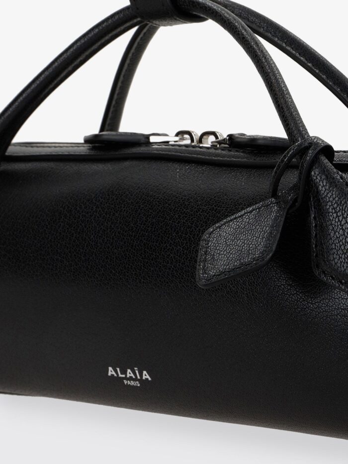 ALAIA Le Teckel Suede Clutch Bag