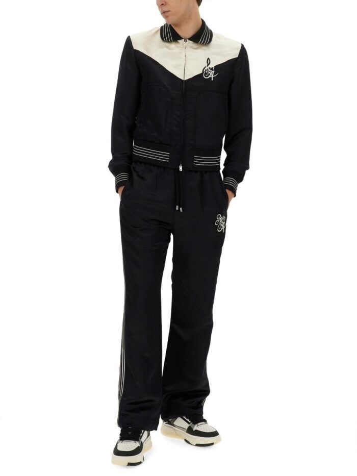 AMIRI PANTS WITH EMBROIDERY