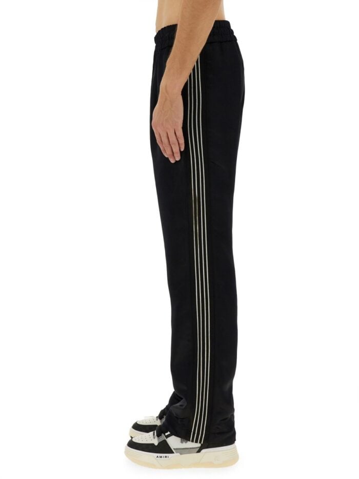 AMIRI PANTS WITH EMBROIDERY