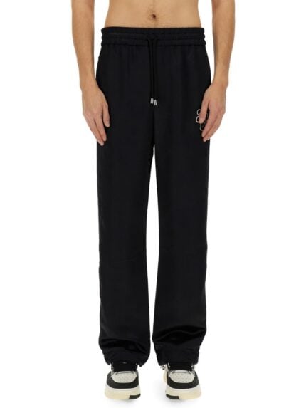 AMIRI PANTS WITH EMBROIDERY