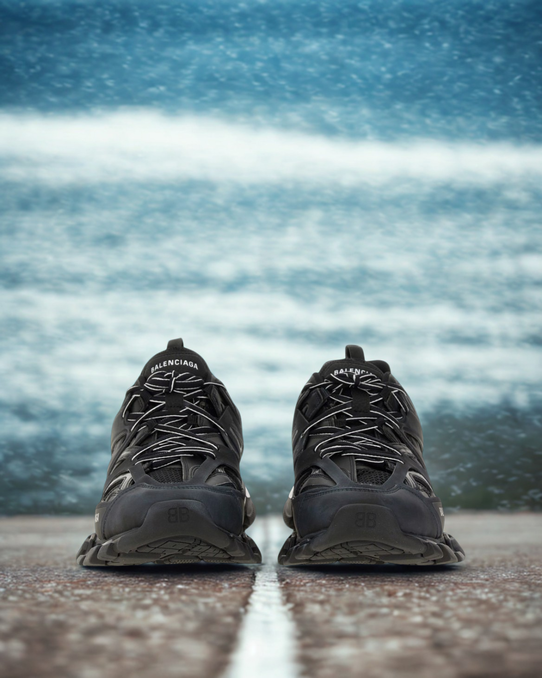 Balenciaga Track Sneakers pair on a road — part of Men's Sneakers Seasonal Offers at THE WISHLINE.