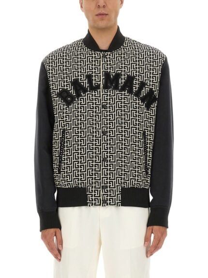 Balmain MONOGRAMMED VARSITY JACKET WITH PATCHES