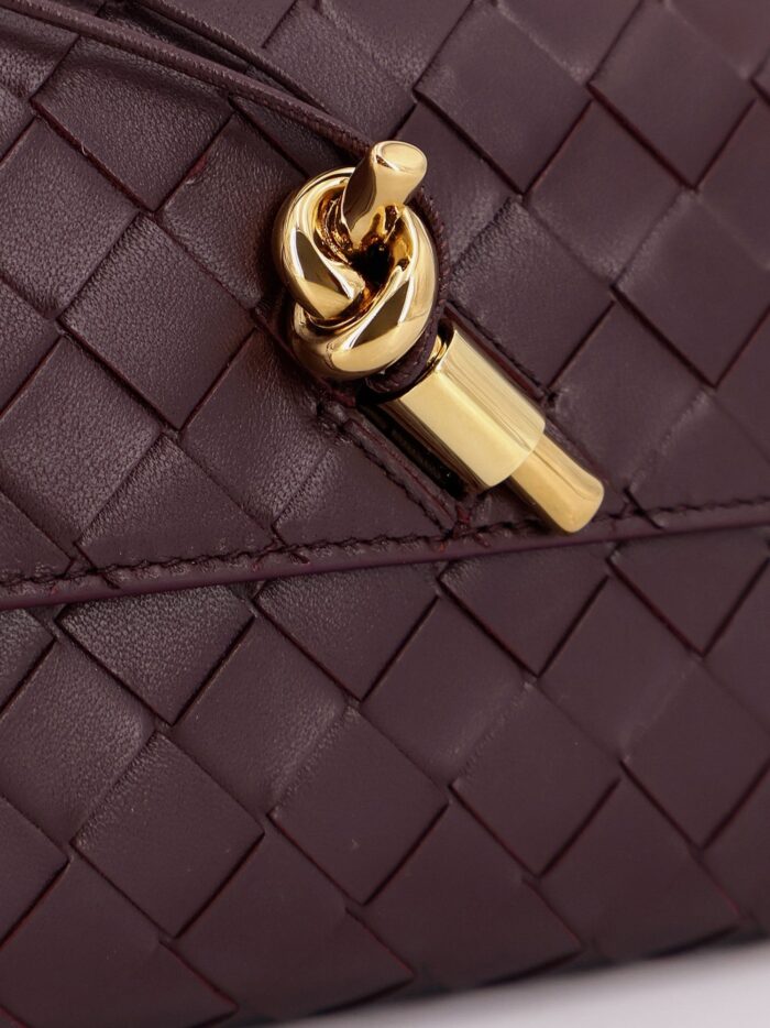 Bottega Veneta Andiamo Leather Clutch With Woven Pattern