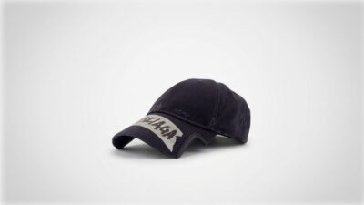 Balenciaga washed black distressed cotton baseball cap featuring a tape-effect logo graphic on a notched brim for THE WISHLINE luxury men's caps and hats collection navigation.