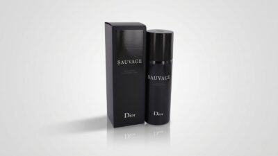 Luxury men's black deodorant spray canister standing next to its matching sleek black product packaging box for THE WISHLINE luxury men's deodorant, body spray, and grooming collection navigation.