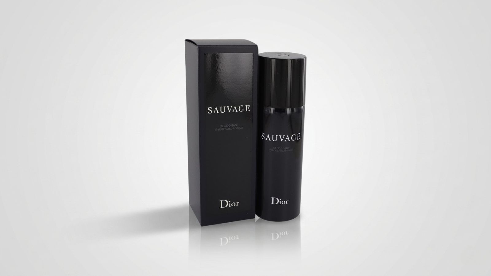 Luxury men's black deodorant spray canister standing next to its matching sleek black product packaging box for THE WISHLINE luxury men's deodorant, body spray, and grooming collection navigation.