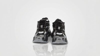 Balenciaga black and metallic silver mesh Runner sneakers featuring the signature size embroidery on the toe cap for THE WISHLINE luxury men's sneakers collection navigation.