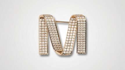 Max Mara crystal-embellished gold-tone 'M' logo brooch pin for THE WISHLINE designer women's assorted jewellery collection navigation.