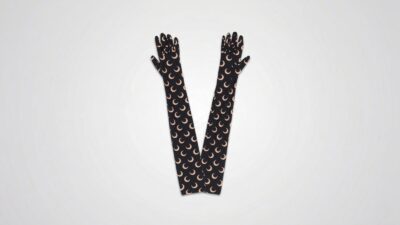 Marine Serre black long opera gloves featuring the iconic tan crescent moon print for THE WISHLINE luxury women's gloves collection navigation.