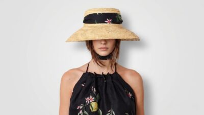 Dolce & Gabbana wide-brim straw sun hat featuring a black floral print silk scarf band for THE WISHLINE luxury women's hats and caps collection navigation.
