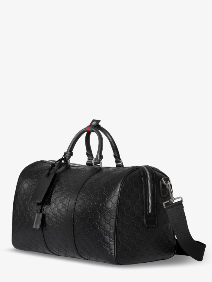 Gucci Coated Canvas Gg Emblem Travel Bag With Gg Motif