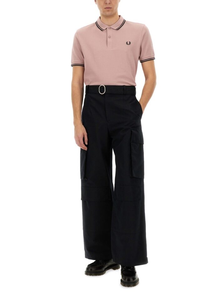 COMME DES GARCONS SHIRT POLO "FREEDOM"