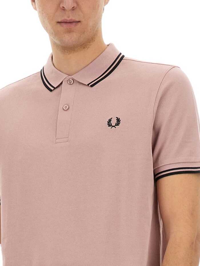 COMME DES GARCONS SHIRT POLO "FREEDOM"