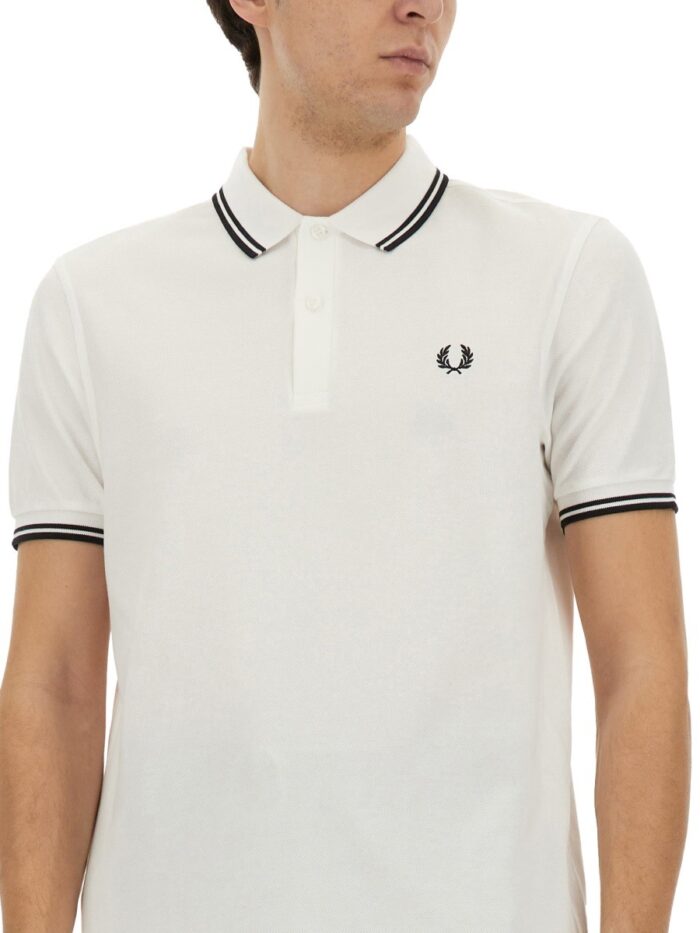 COMME DES GARCONS SHIRT "STRONG WILL" POLO SHIRT