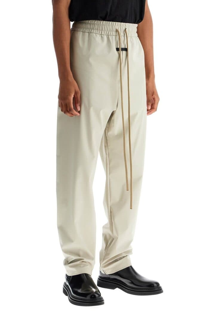 FEAR OF GOD Wide Leg Nylon Track Pants In Cement