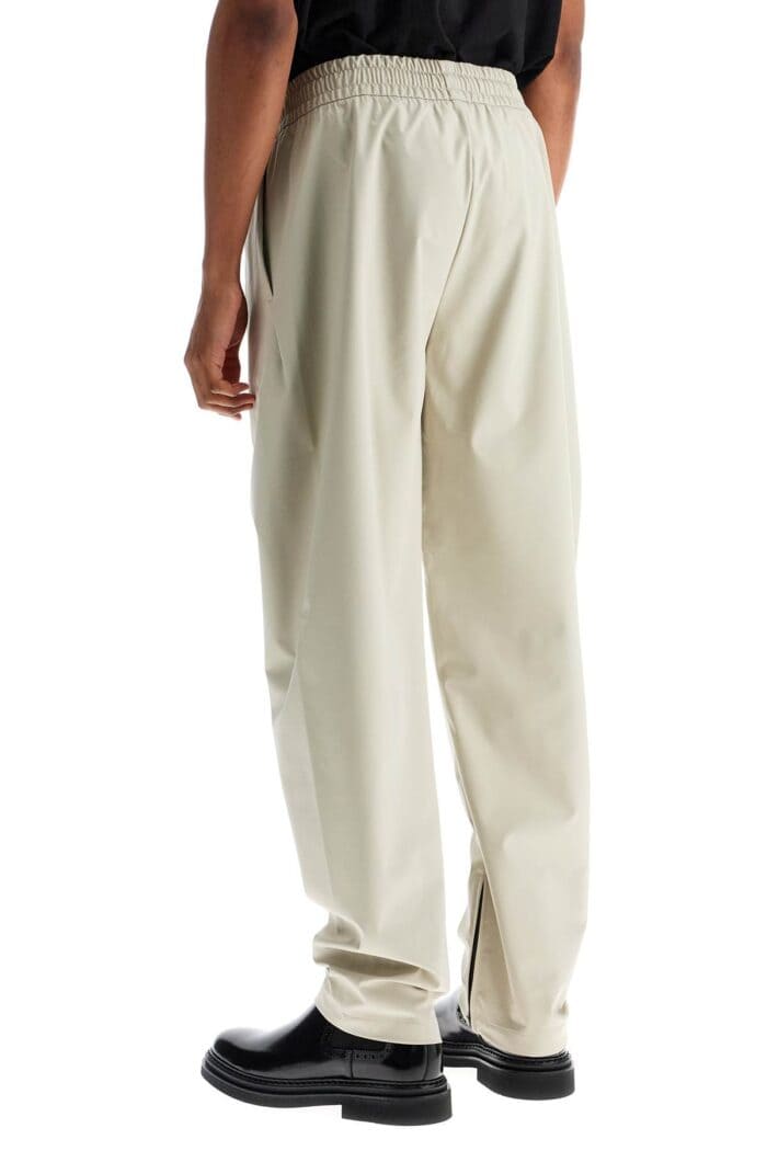 FEAR OF GOD Wide Leg Nylon Track Pants In Cement