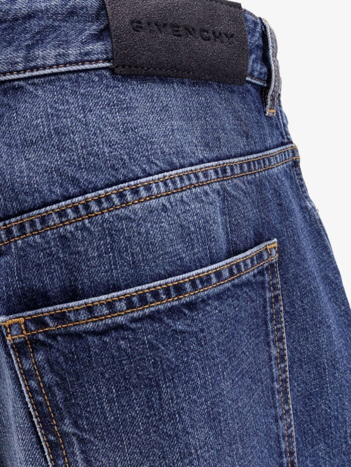 Givenchy Twisted Stone-washed Denim Jeans