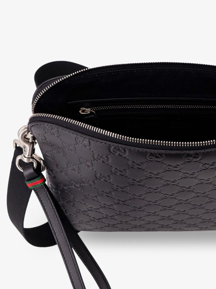Gucci Leather Gg Emblem Crossbody Bag With Embossed Gg Motif