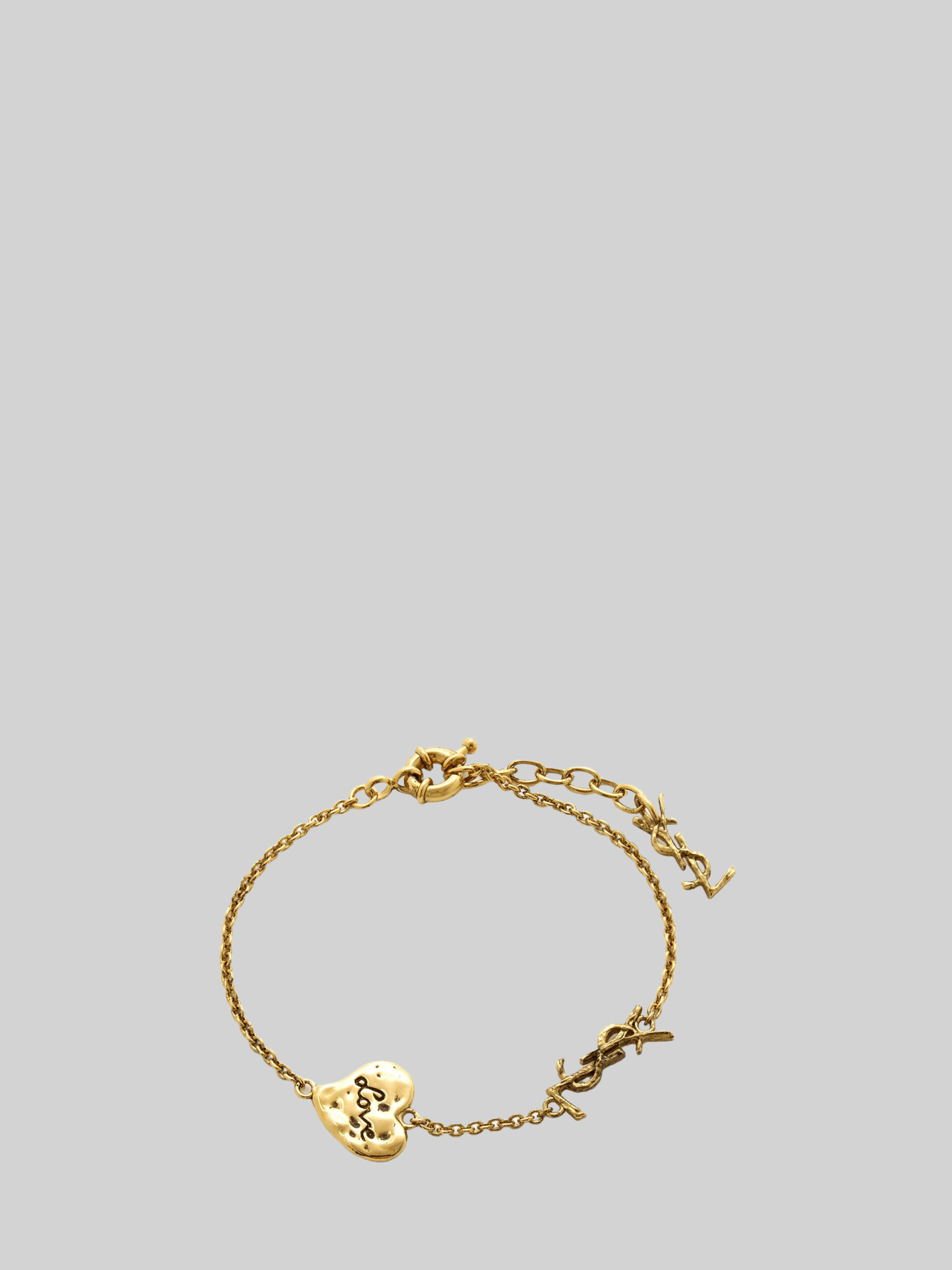 Saint Laurent Cassandre heart bracelet in brass
