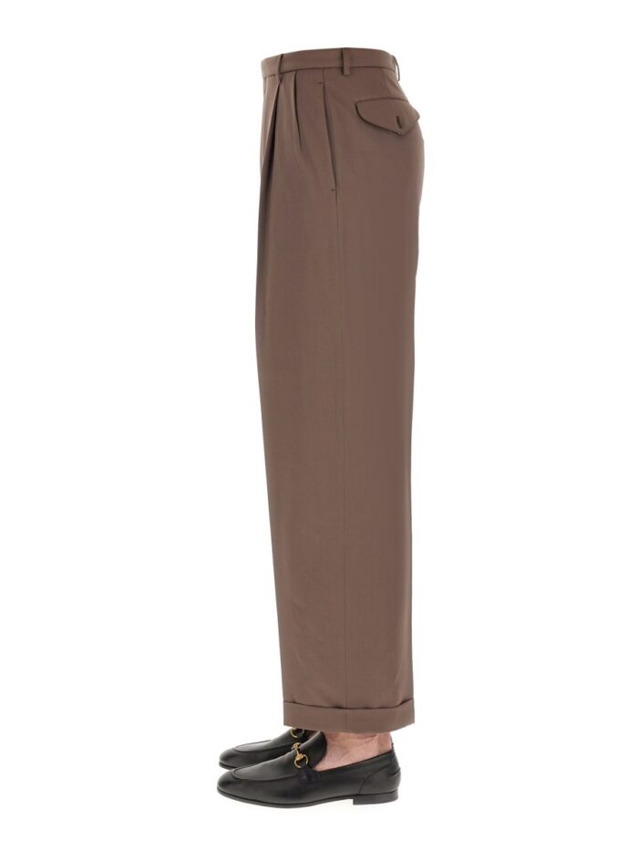 PANTS WITH GUCCI LABEL