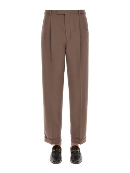 PANTS WITH GUCCI LABEL