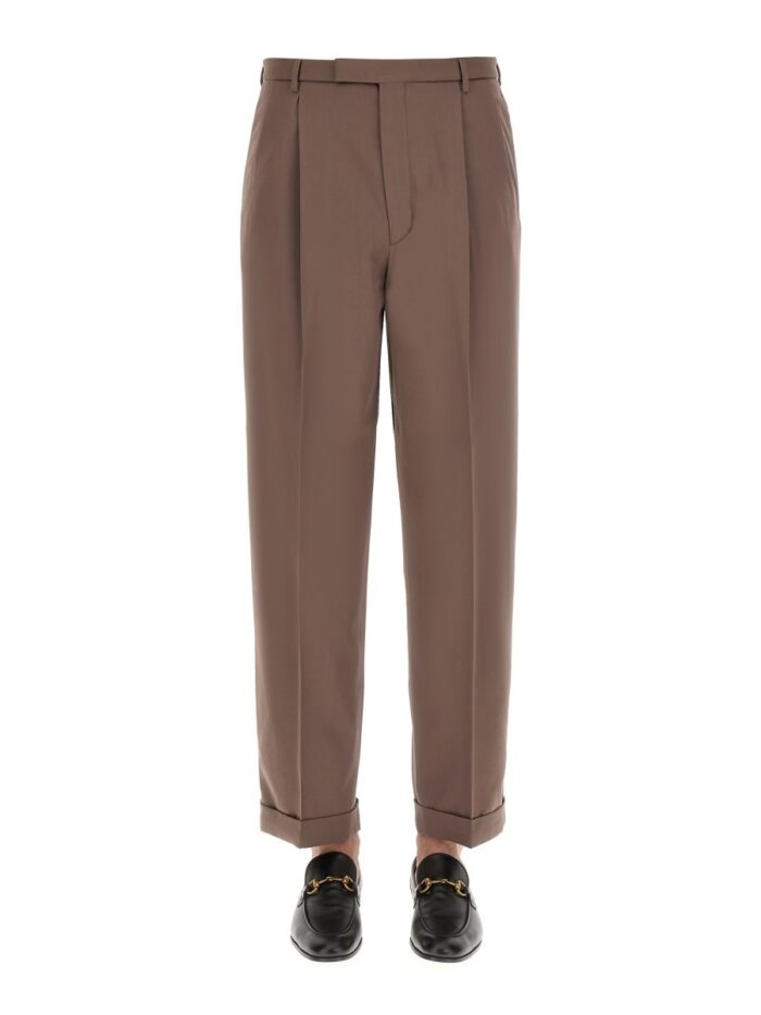 PANTS WITH GUCCI LABEL