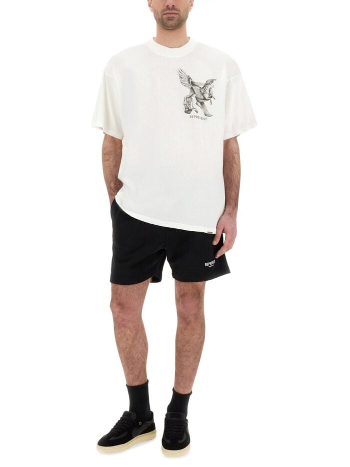 Represent "ELEGANCE IN MOTION" T-SHIRT