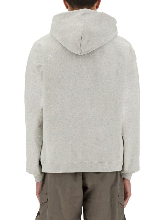 Represent "INITIAL" HOODED AND ZIPPERED SWEATSHIRT