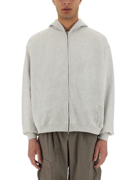 Represent "INITIAL" HOODED AND ZIPPERED SWEATSHIRT