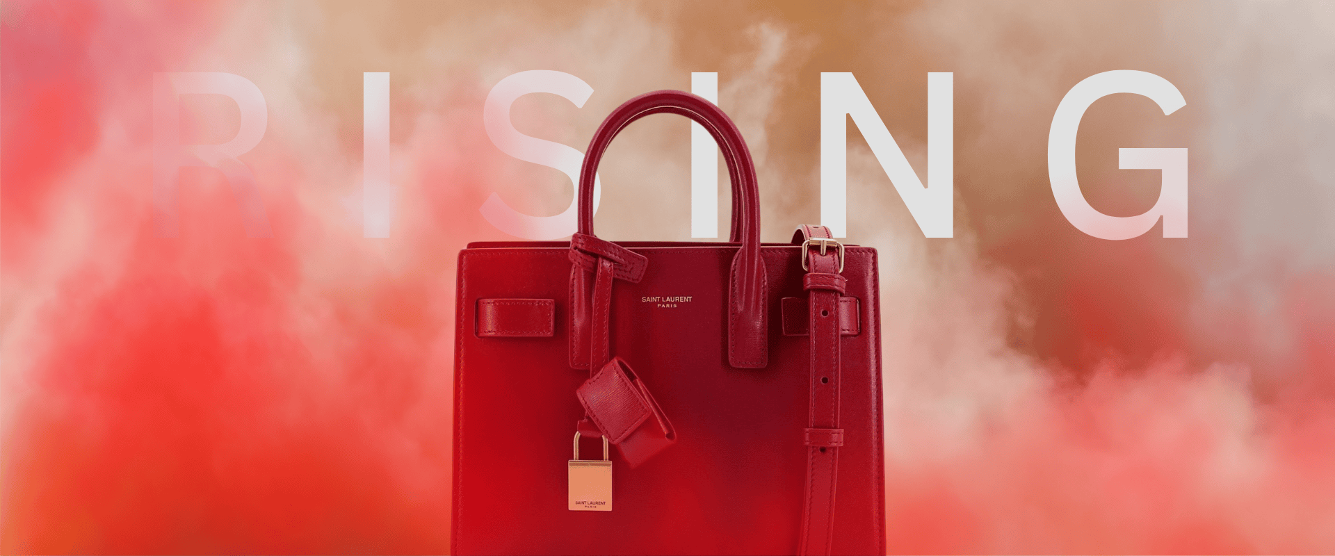 Red Saint Laurent designer bag with 'RISING' text on a smoky backdrop – banner linking to The Edit: Iconic Bags for Women on THE WISHLINE.