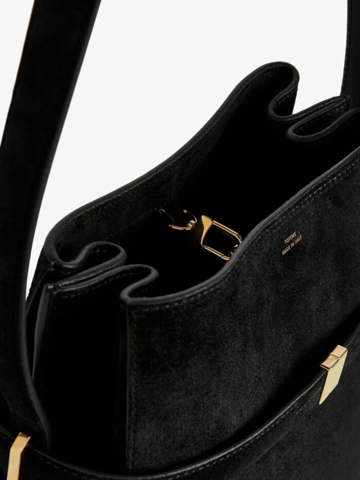 toteme suede shoulder bag with metal detail on the front TOTEME Suede Shoulder Bag With Metal Detail On The Front