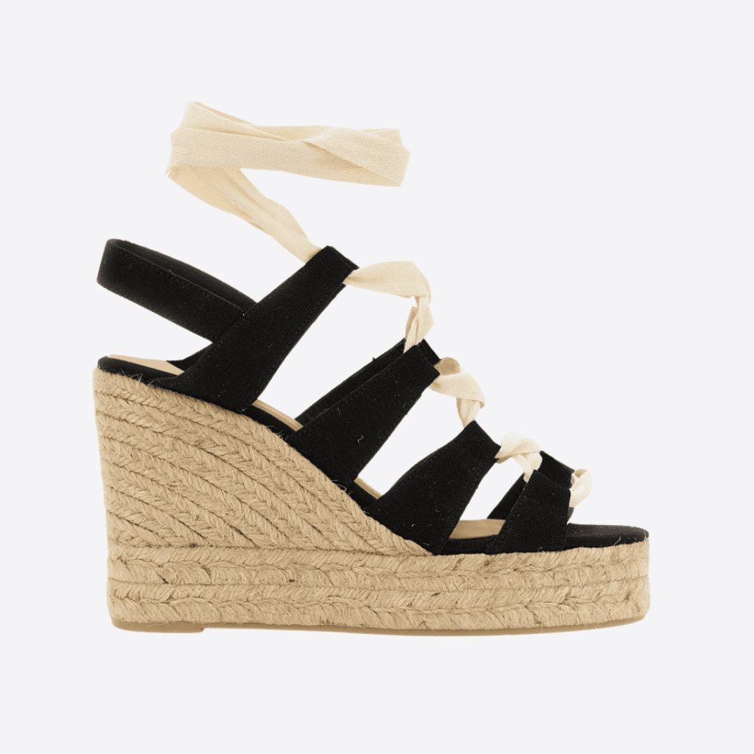 Cream colour wedge with black top.